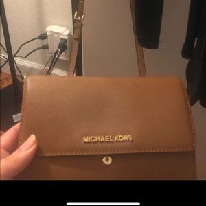 MK purse, coach sunnies, and Ralph sunnies